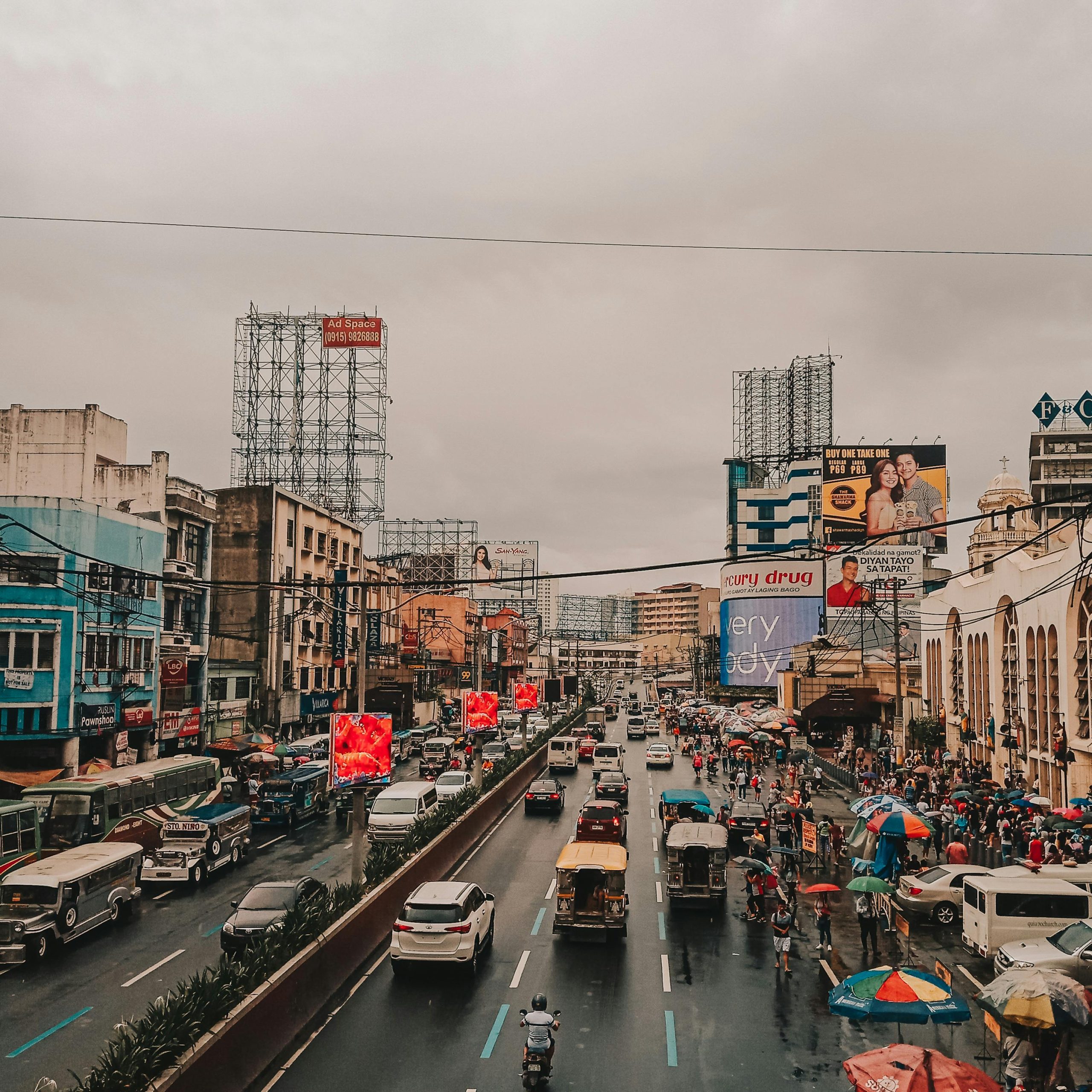 Cars on a major road in an urban area of Philippines